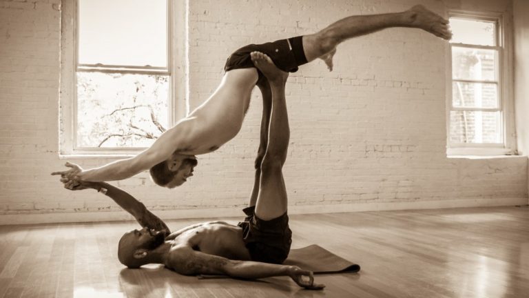 Double downward dog - Couples Yoga: 5 Yoga poses to strengthen