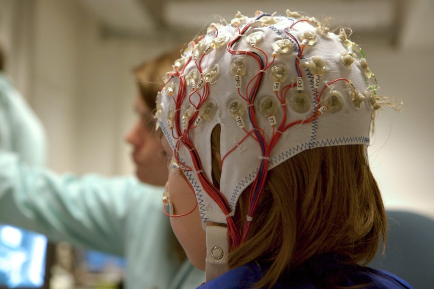 girl connected with cables for eeg for a scientific experiment 2